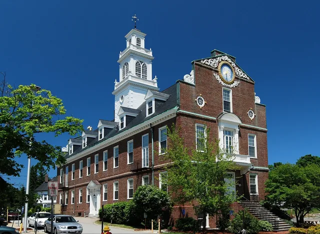 weymouth, massachusetts, town hall, nature, building, clock tower, trees, architecture, landmark, sky, clouds, outside, plants, street, urban, town, cars, autos, blue clock. 9 points on city and county licenses that matter