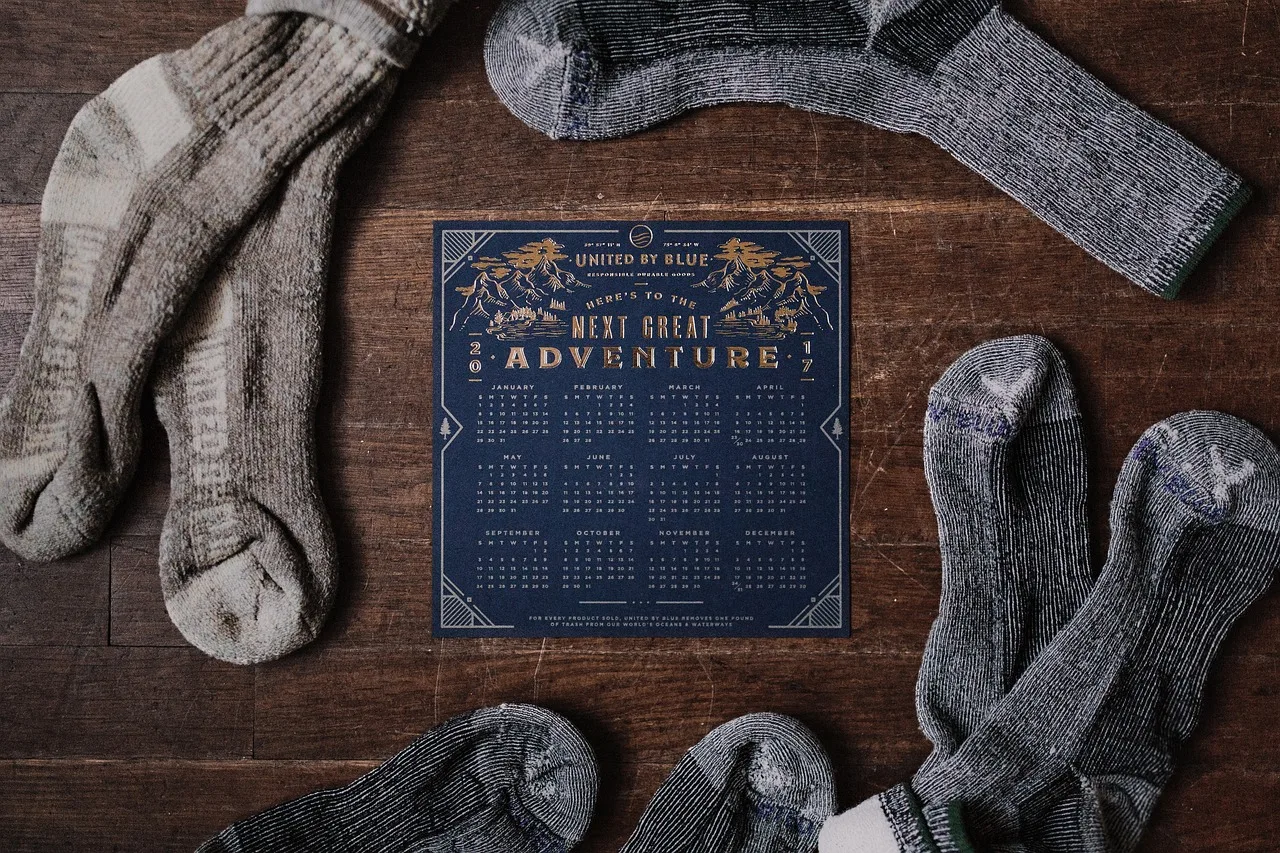 calendar, wooden, table. Why compliance calendars go stale, and the yearly fix that works