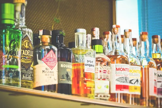 bottles, alcohol, drinks, bar, liquor, beverages, mixed drinks, cocktails, alcohol bottles, glass bottles, alcoholic drinks, alcoholic beverages, shelf, restaurant, alcohol, alcohol, alcohol, alcohol, alcohol, bar, liquor. Chicago liquor license: what to settle before the lease